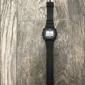 black Casio G-Shock digital watch